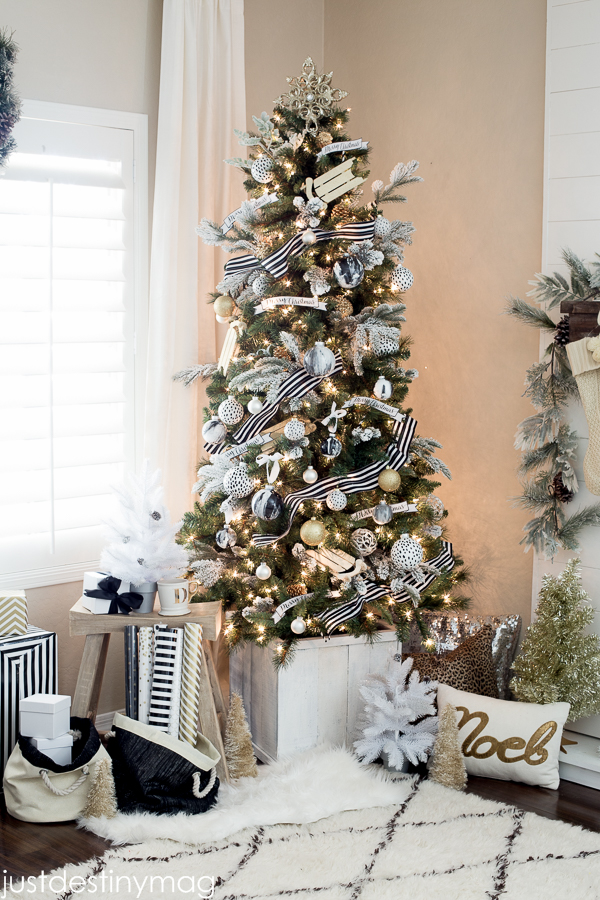 Black and White Christmas Tree with stripe ribbon. Just Destiny makes beautiful Christmas trees.