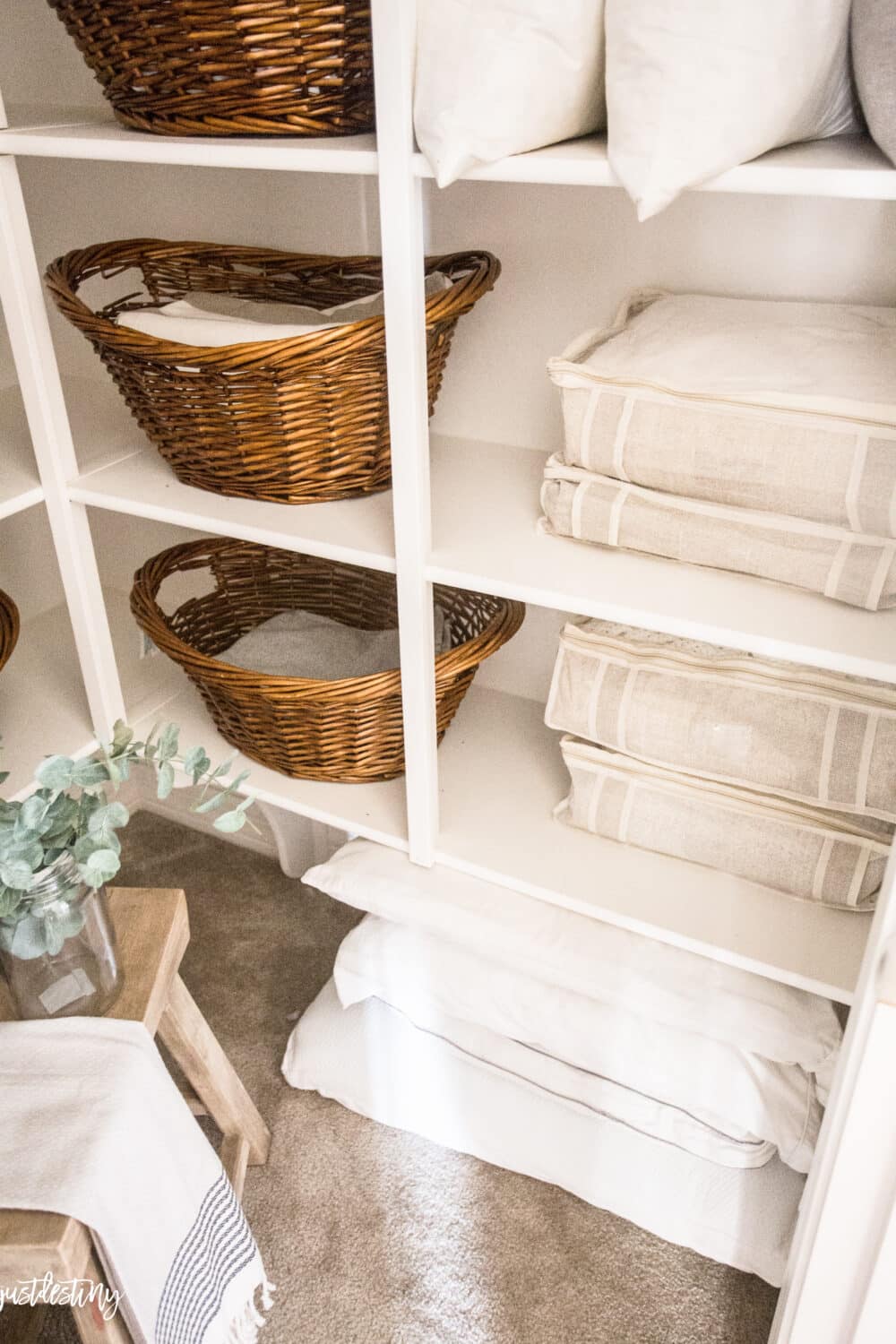 Organized closet with baskets and bins 