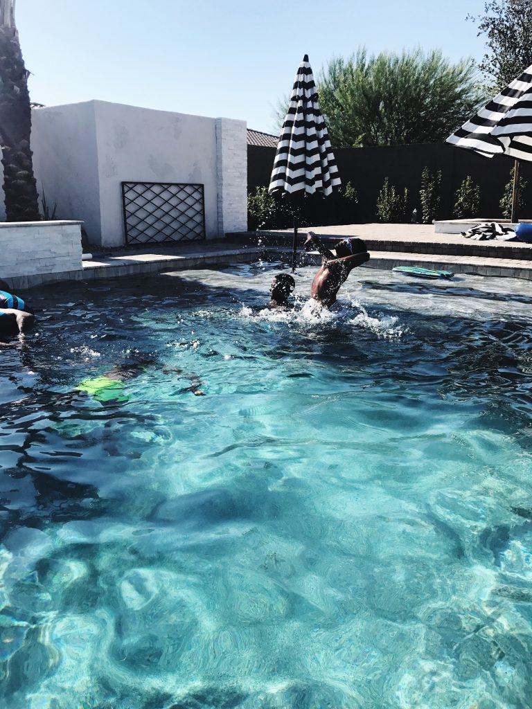 Poolside Essential kids having fun in the pool