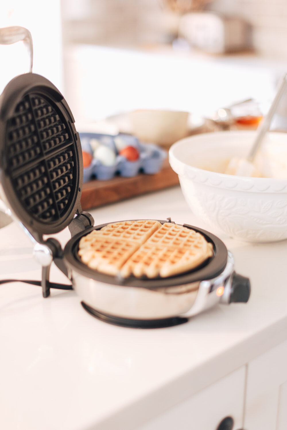 Waffle maker with waffle in it