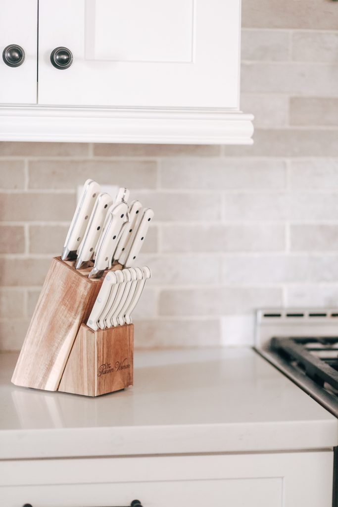 Photo of Kitchen Knives Set artistic still life on white