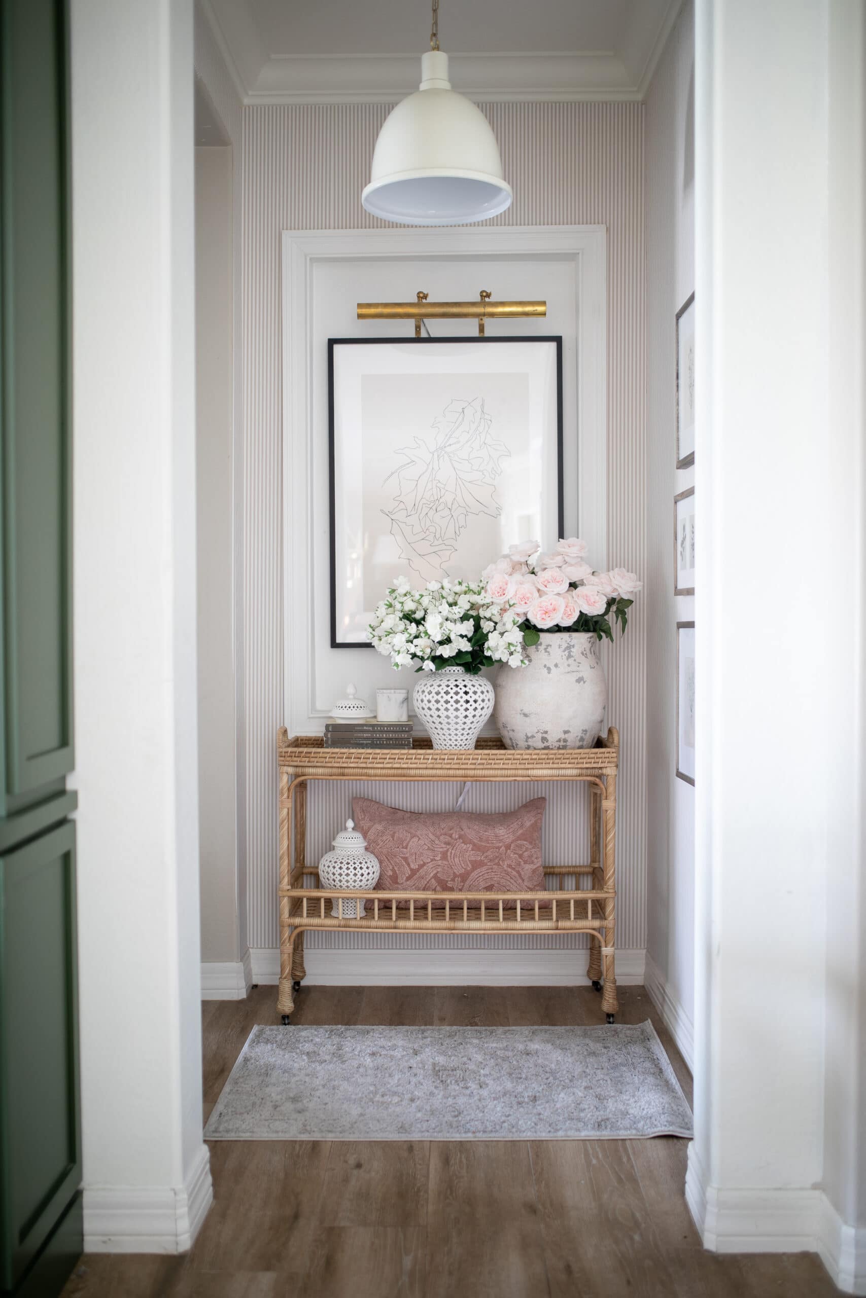 Hallway Decor Ideas with a rattan table from Serena and Lily 