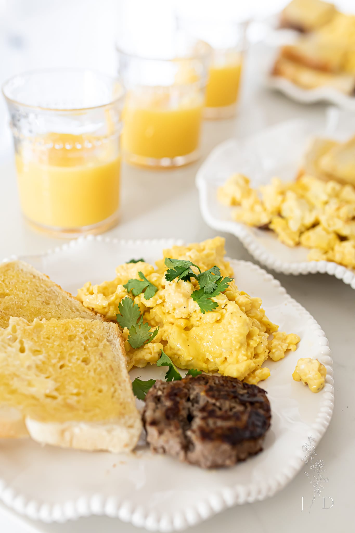 Scrambled Eggs with Sausage and Toast 