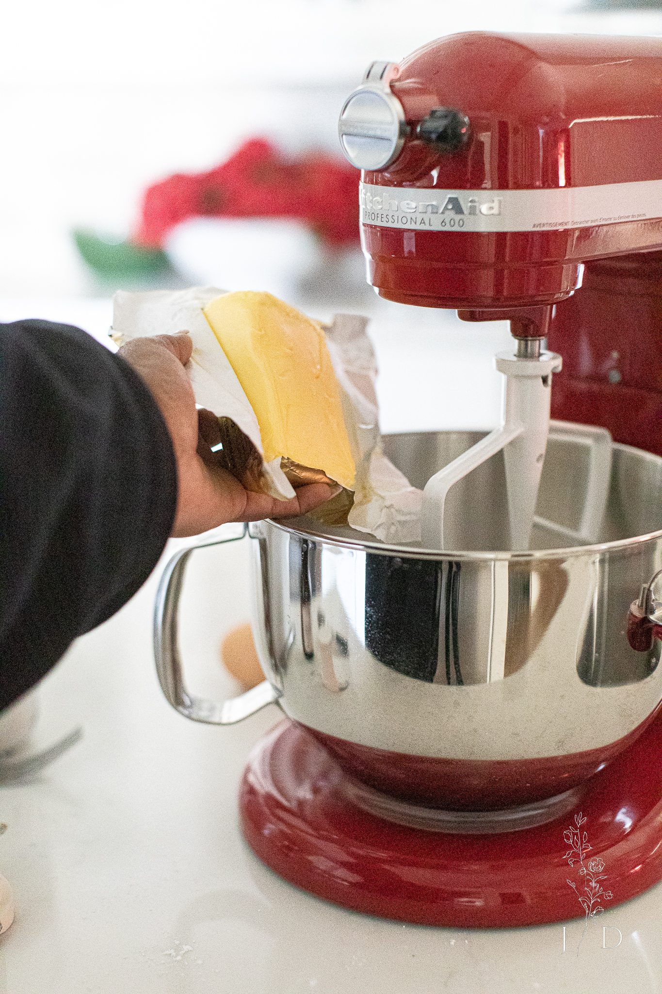 Block of butter into a stand mixer 