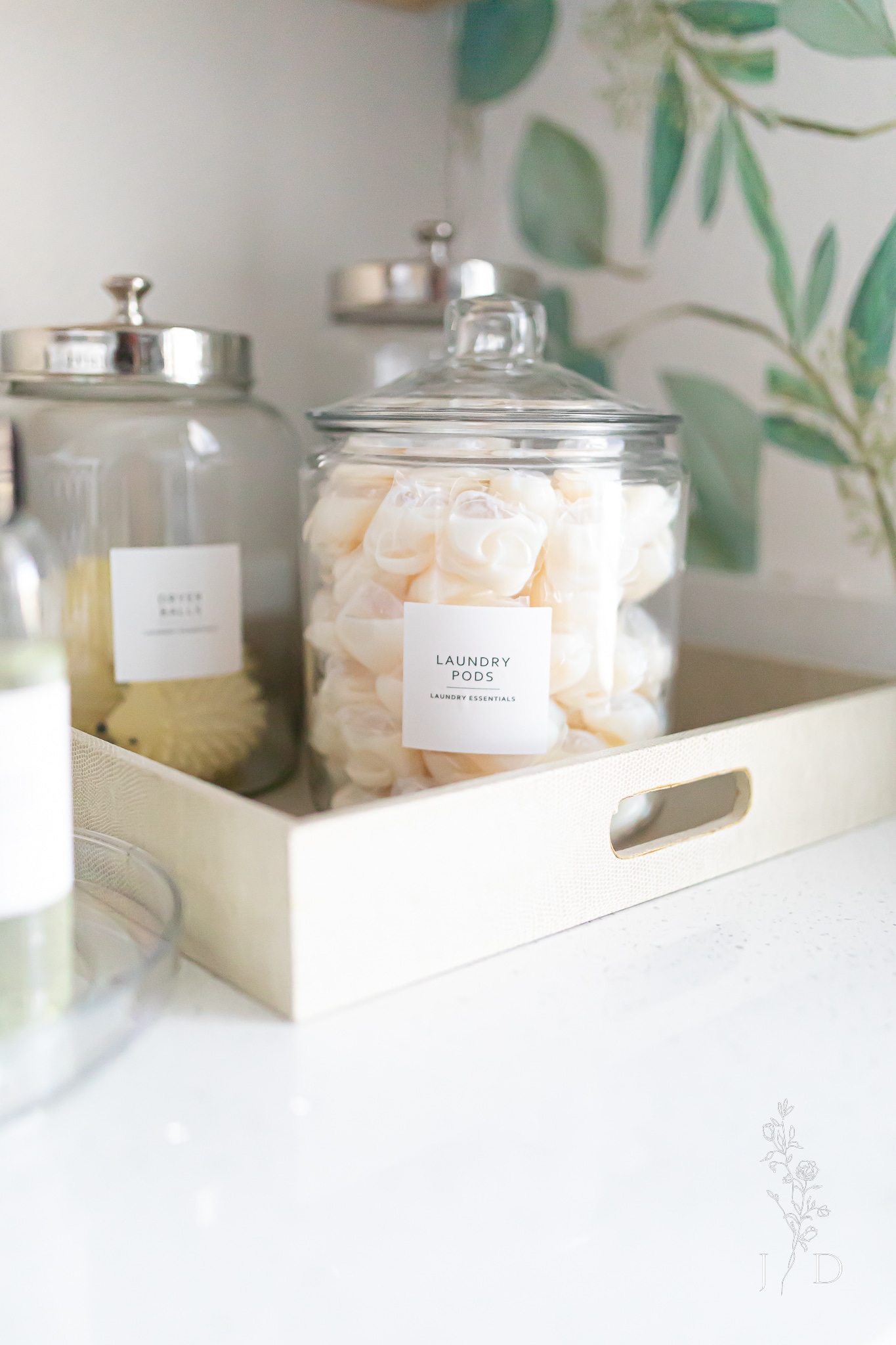 Organize tide pods in a glass jar with label 