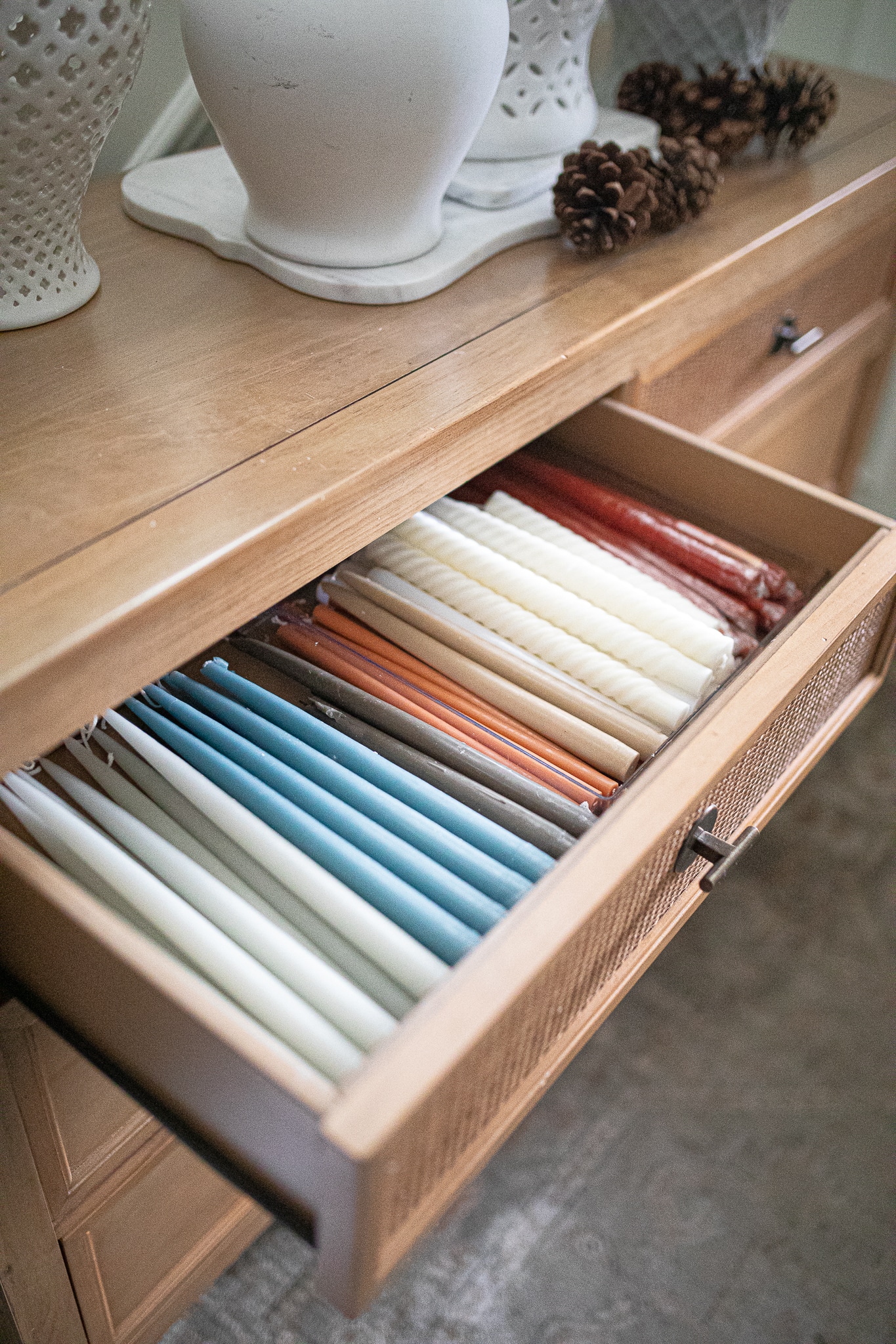 Tapered candle organization ideas in a drawer