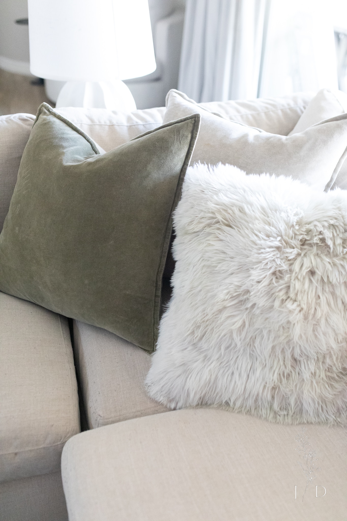 Arhaus pillows in different textures and colors. 
