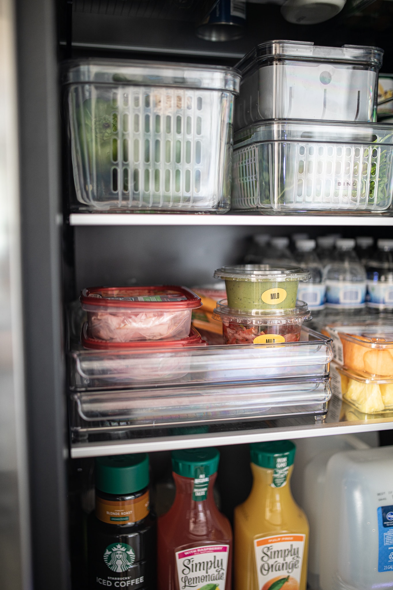 Fridge organized with a black interior 