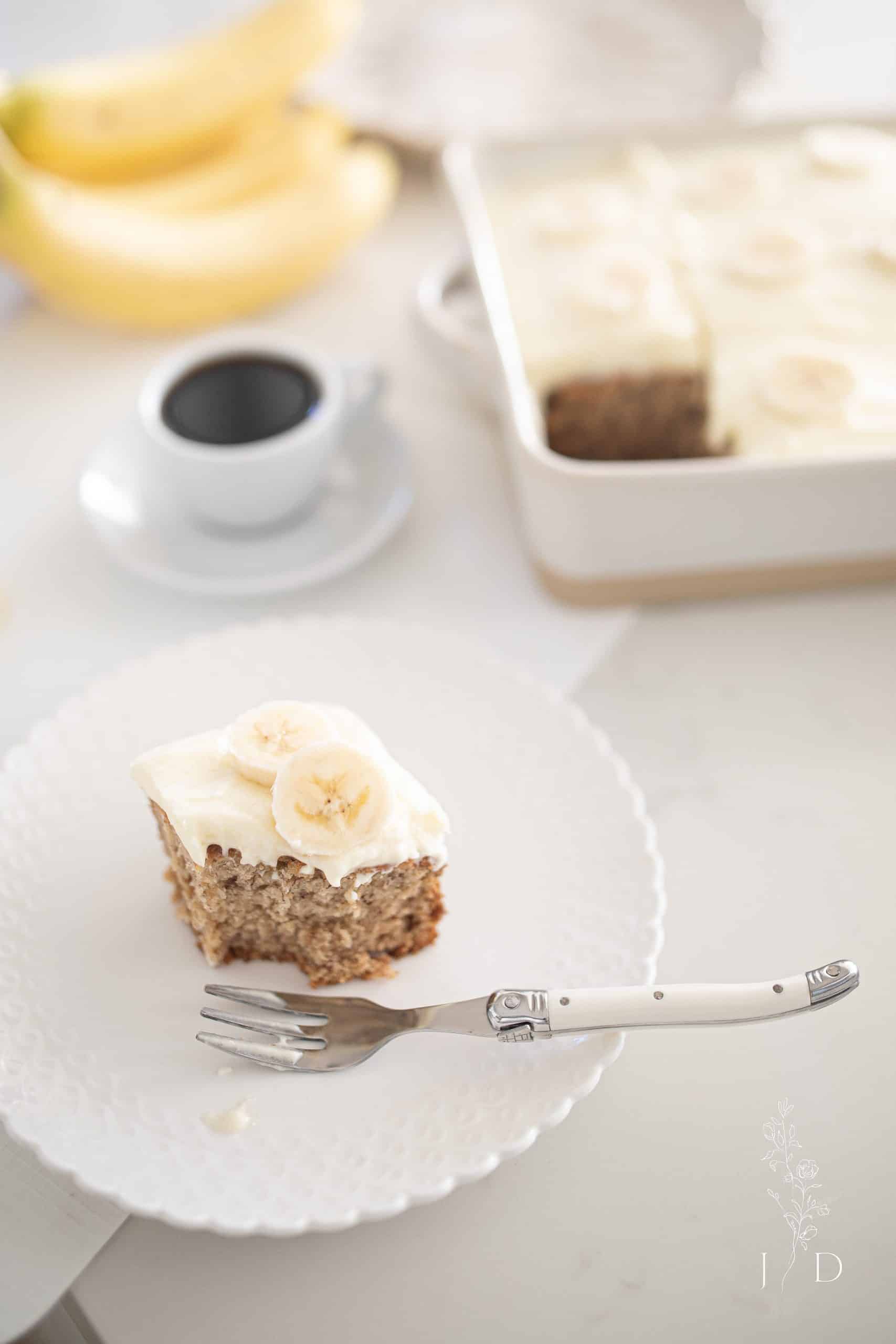 slice of banana cake with fresh banana slices 