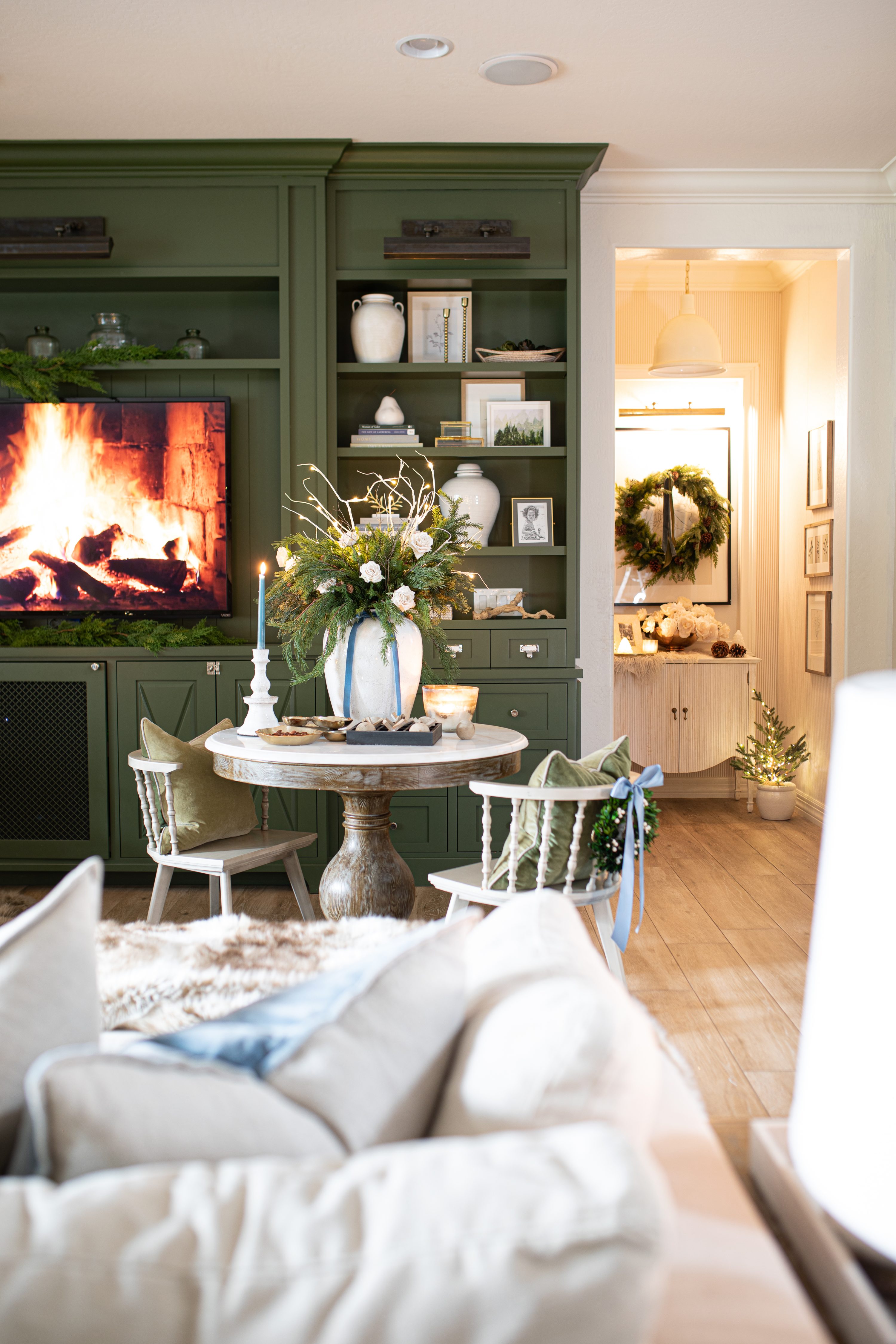 Christmas Family room setting with fireplace on the tv