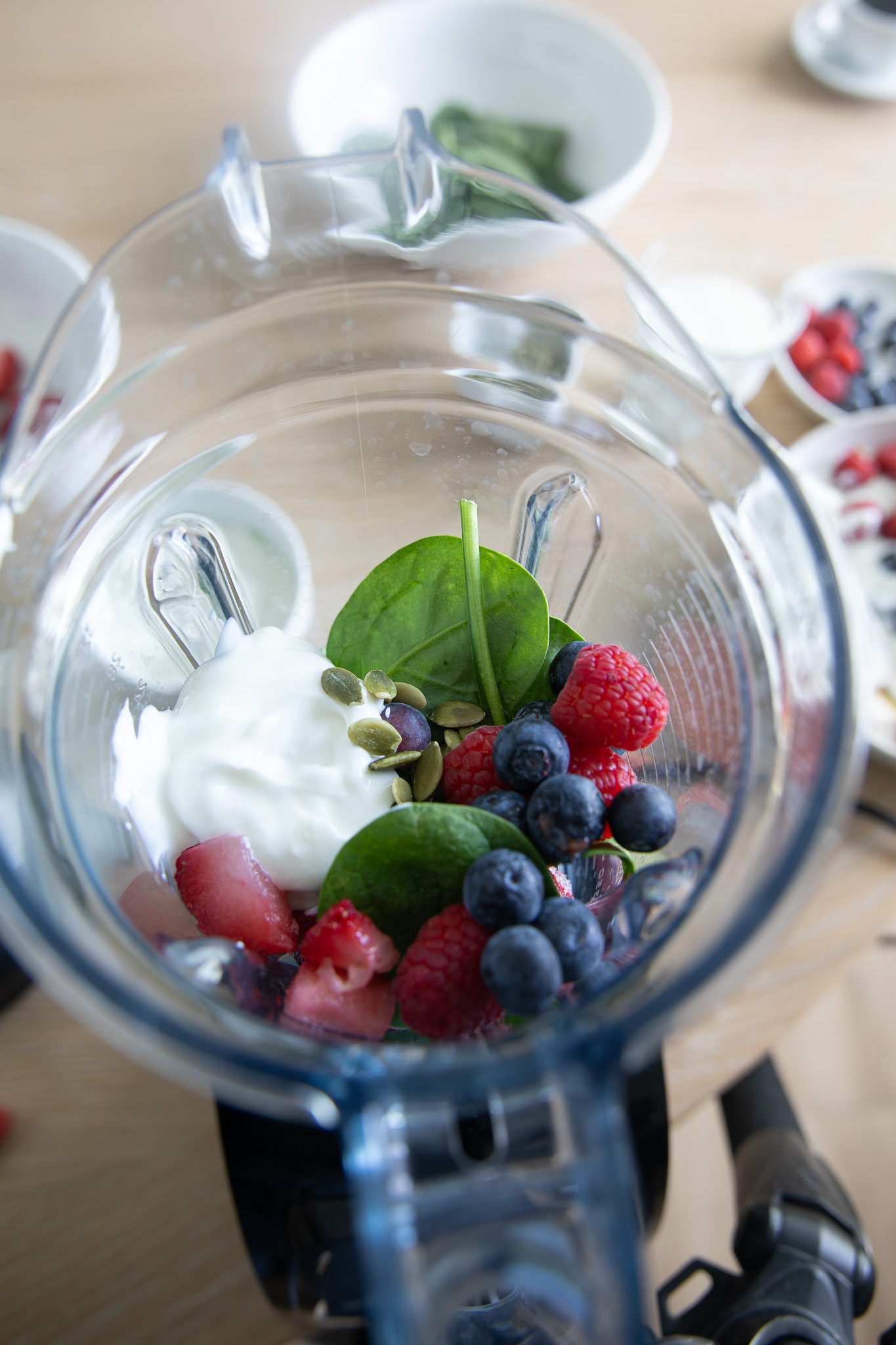 the ingredients of a simple berry greek yogurt smoothie